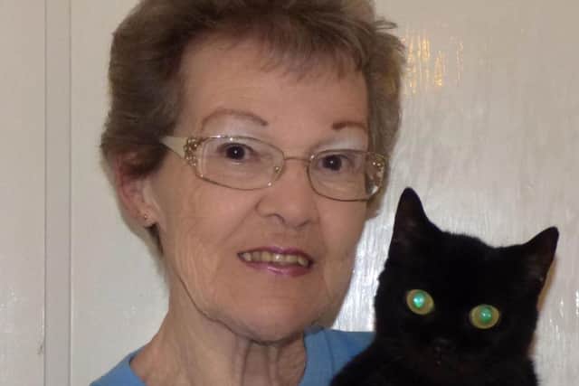 Worthing Cat Welfare Trust co-founder Iris Green with 21-year-old Leona