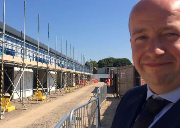 Headteacher of The Academy, Selsey, Tom Garfield at the building site. SUS-180307-180402001