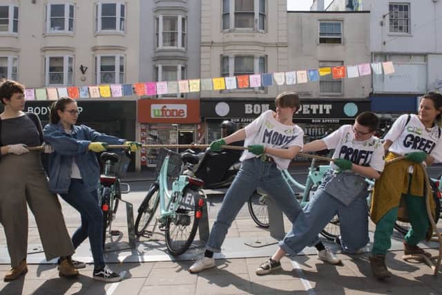 Activists from Brighton Extinction Rebellion stage a Fete of the World outside the branch of Barclays Bank, North St Brighton
Photography www.DFphotography.co.uk