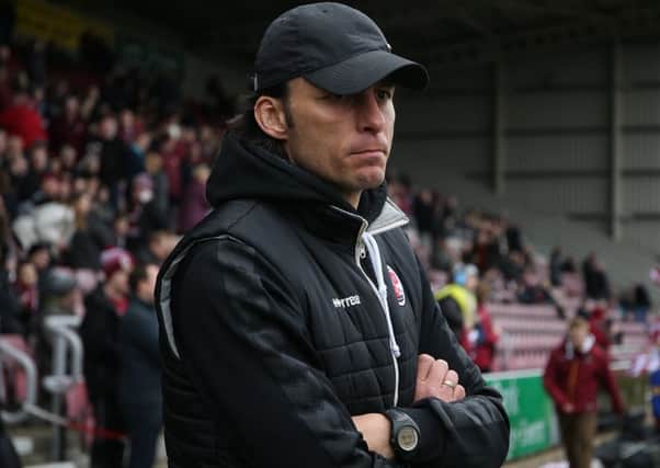 NORTHAMPTON, ENGLAND - FEBRUARY 16: Crawley Town head coach Gabriele Cioffi looks on prior to the Sky Bet League Two match between Northampton Town and Crawley Town at PTS Academy Stadium on February 16, 2019 in Northampton, United Kingdom. (Photo by Pete Norton/Getty Images) SUS-190221-085206001