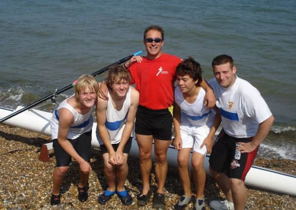 Garry Saunders, captain of the Shoreham Rowing Club, with some of the junior rowers