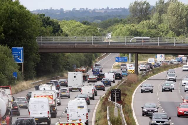 Work is continuing to change part of the M23 into a smart motorway