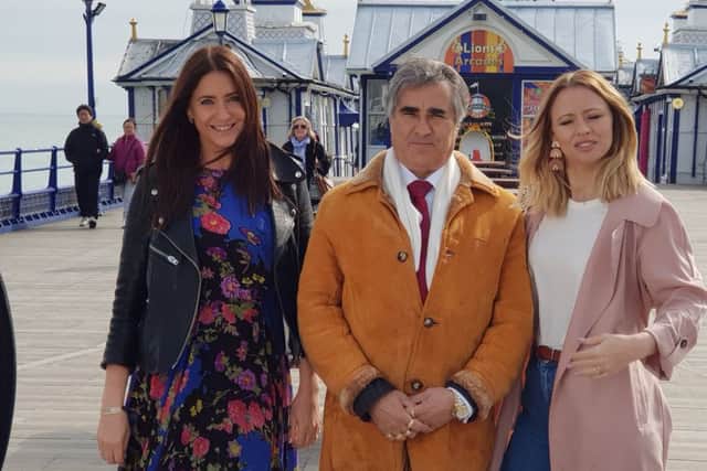 Abid Gulzar with Lisa Snowden and Kimberley Walsh on Eastbourne Pier