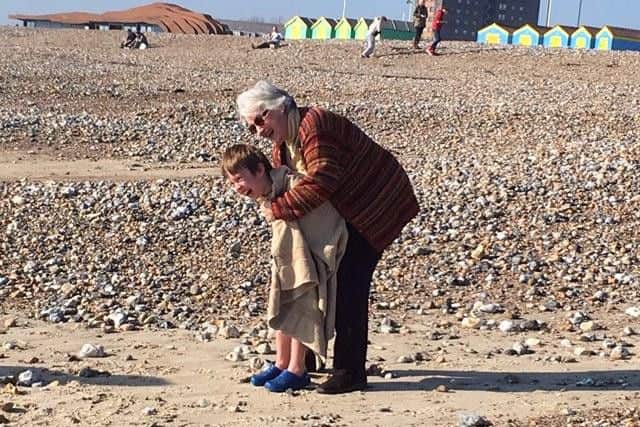 Callum with his grandmother Sue Harris on Littlehampton beach