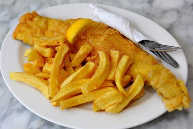 Fish and chips, served up on one of the marble tables at Littlehampton Fish and Chips. Picture: Steve Robards SR1909018