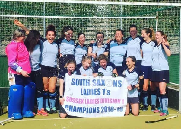 South Saxons Hockey Club's ladies' first team celebrates after winning the Sussex Ladies' League Division One title