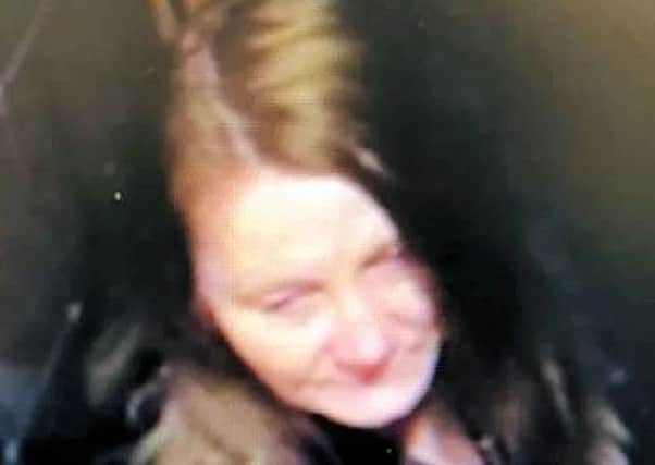 Police have released this image of a woman they want to speak to in connection with a bag theft in the Crown and Anchor Pub, Eastbourne