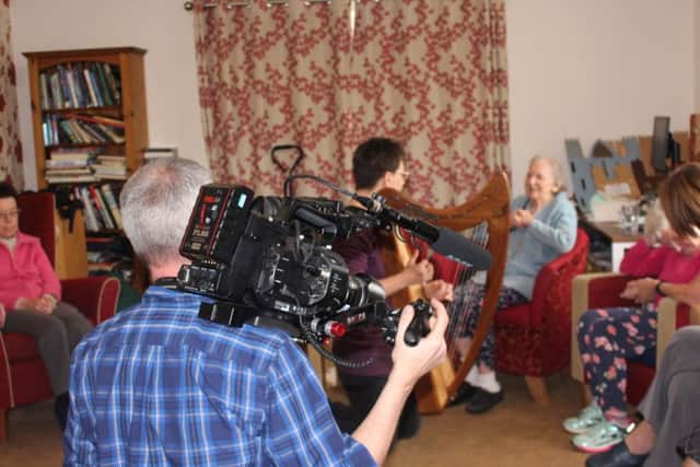 The BBC One camera crew for Songs of Praise at the Guild Care's Bradbury Wellbeing Centre