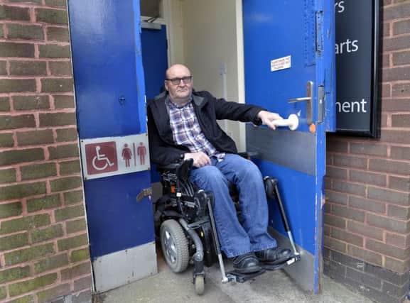 Ian Westgate who is unhappy that the refurbishment of Langney shopping centre in Eastbourne does not include a disabled toilet (Photo by Jon Rigby) SUS-190404-093715008