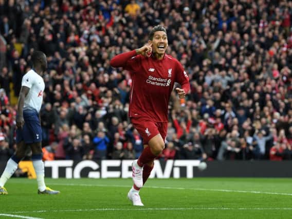 Liverpool striker Roberto Firmino celebrates scoring against Tottenham last weekend. Picture by Getty Images