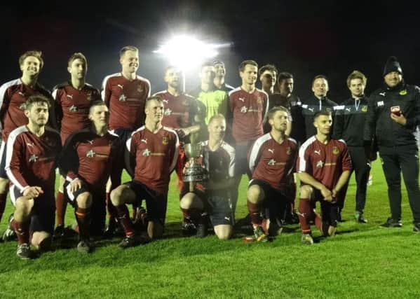 Wadhurst United celebrate after winning the Hastings & District FA Junior Cup