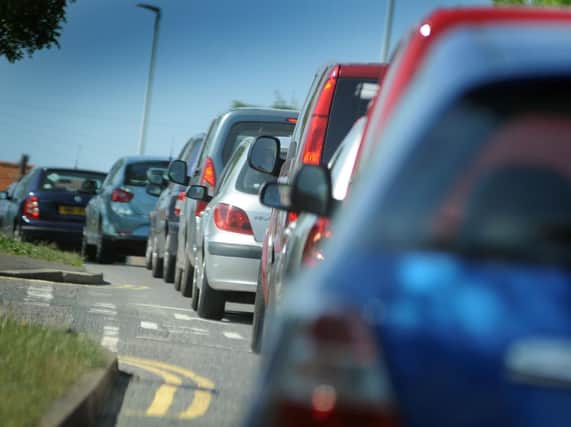A two-car collision on the A27 is causing delays