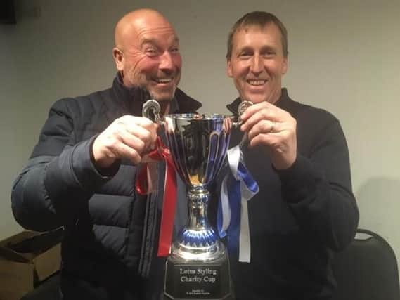 Jez Burton and Nicky Miles with the trophy