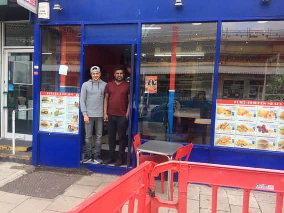 Manager Azram Rahman and owner Simon Thevthas at RFC takeaway, Eastbourne 04-04-19