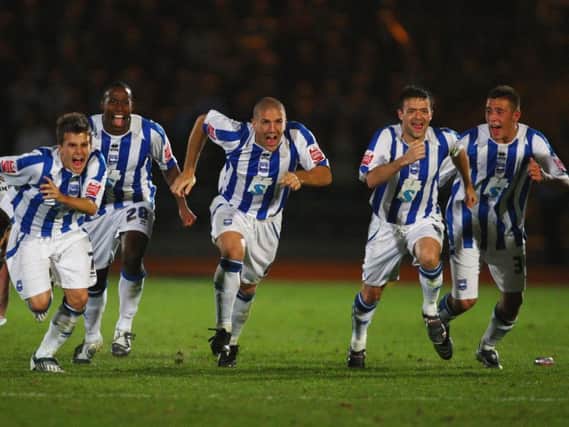 Brighton celebrate beating Manchester City on penalties in the League Cup in 2008. Picture by Getty Images