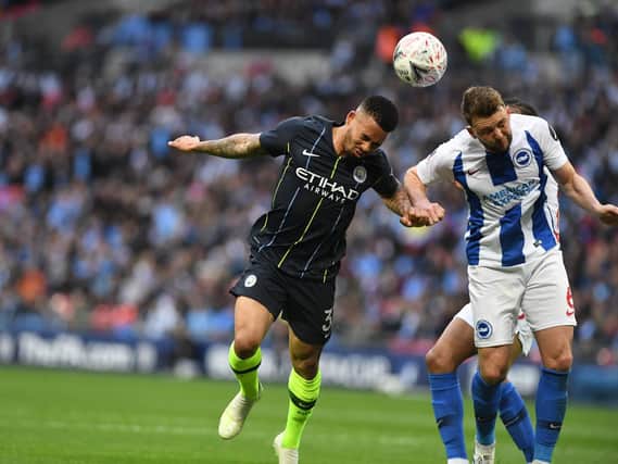 Gabriel Jesus and Dale Stephens compete for the ball during the FA Cup semi-final between Brighton & Hove Albion. All pictures by PW Sporting Photography.