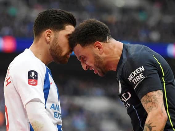 The incident between Kyle Walker and Alireza Jahanbakhsh late in the first half. Picture by Getty Images