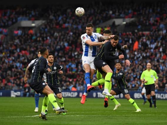Shane Duffy challenges for a set-piece during Brighton's FA Cup semi-final with Manchester City. Picture by Getty Images