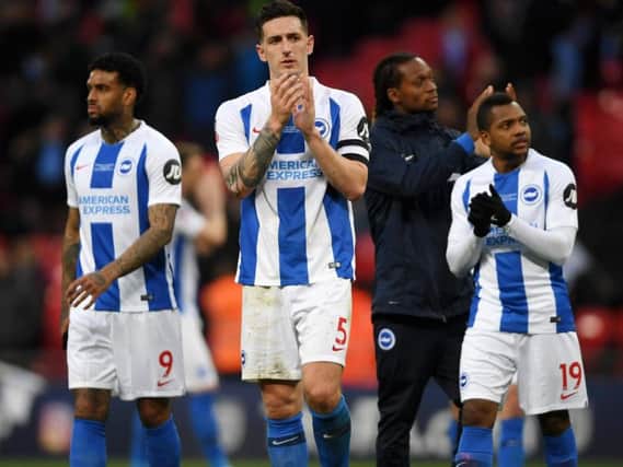 Lewis Dunk applauds the Brighton fans. Picture by Getty Images