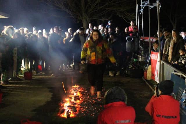 Walking on hot coals for St Barnabas House hospice in Worthing