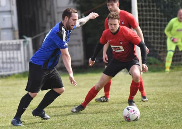 Action from Hollington United's 3-0 defeat at home to Cuckfield Rangers. Picture by Justin Lycett
