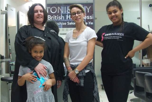 Rachel with her daughters Aiesha, 15, and Tamina-Grace, seven, and hairdresser Lauren
