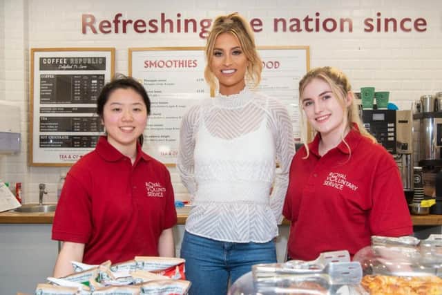 Ferne meets volunteers at the hospital in Brighton. Photo: Matt Crossick/PA Wire