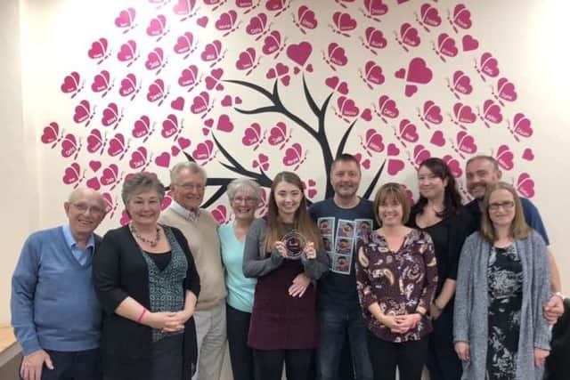Hannah (front centre) won a Pride of Britain fundraising award in 2018