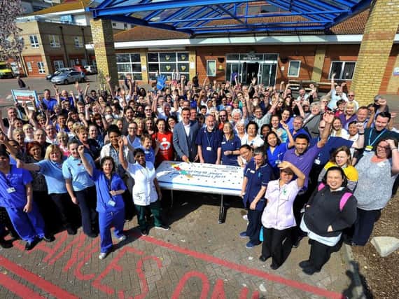 Staff outside Worthing Hospital celebrating the milestone. Picture: Steve Robards