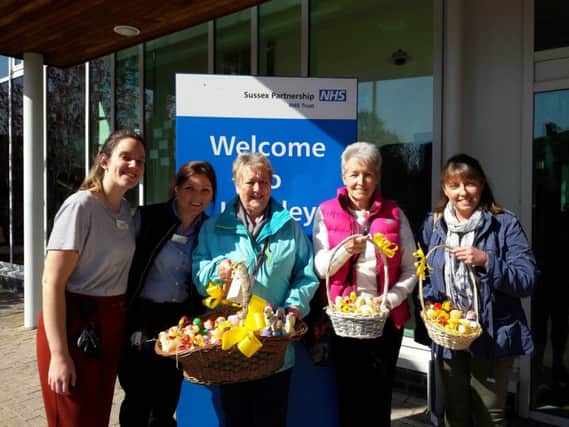 Mannings Heath WI at Langley Green Hospital with the knitted Easter chicks SUS-190429-155848001