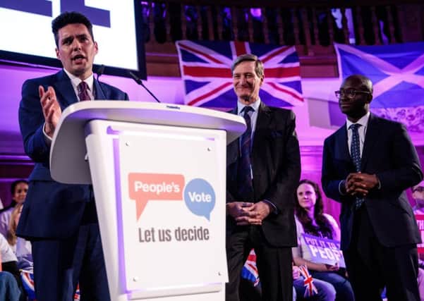 MP Huw Merriman (L) speaks at a 'People's Vote' rally calling for another referendum on Brexit on April 9, 2019 in London, England.  (Photo by Jack Taylor/Getty Images)