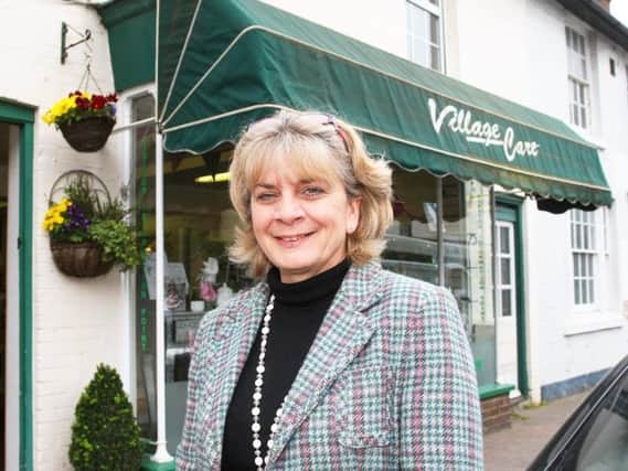 Christina Hoad, outside Village Care, which is home to 'Christina's' tea room
