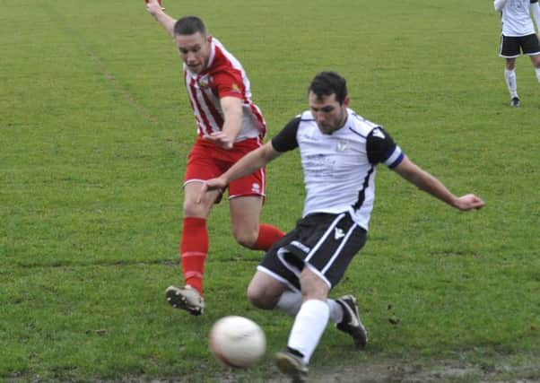 Action from November's reverse fixture between Bexhill United and Steyning Town. Picture by Simon Newstead