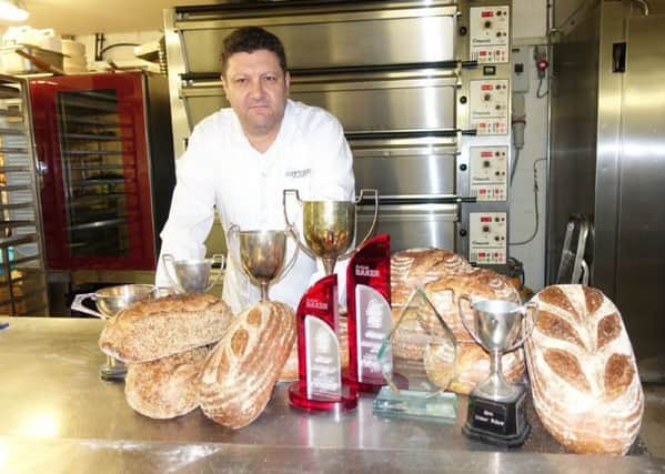 Lee Smith with his award-winning loaves SUS-190417-101616001