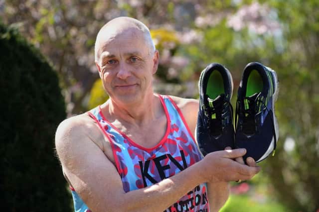 Running shoes at the ready ... Kevin Miller will pound the streets of London