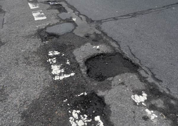 Calls have been made to pilot a new approach to repairing potholes in East Sussex