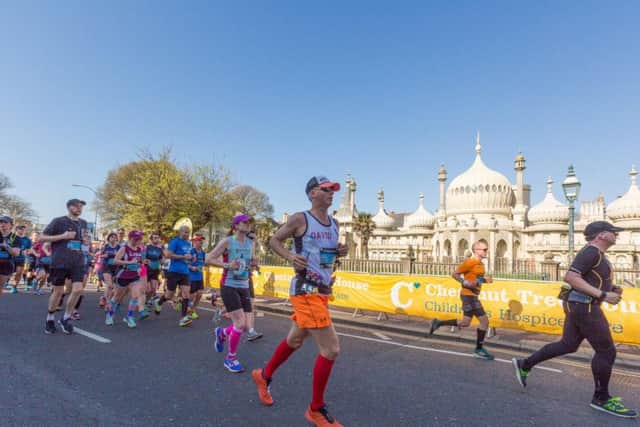 Running past the Royal Pavilion during the Brighton Marathon (Credit: Grounded Events)