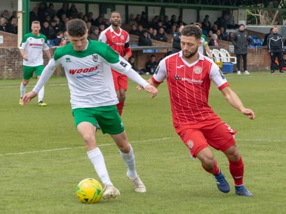 Leon Maloney takes the game to Harlow / Picture by Darren Crisp