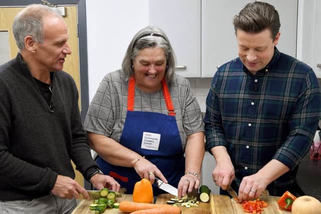 Tesco Community Cookery School with Jamie Oliver. Picture by Andrew Parsons / i-Images SUS-190415-141120001