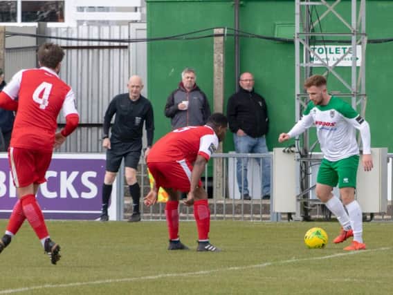 Theo Widdrington on the ball against Harlow / Picture by Darren Crisp
