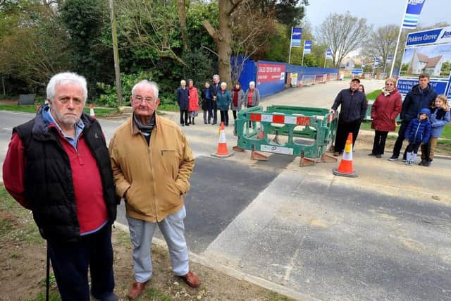 Roger Whaley and Rod Dune and other concerned residents in Folders Lane, Burgess Hill. Photo by Steve Robards