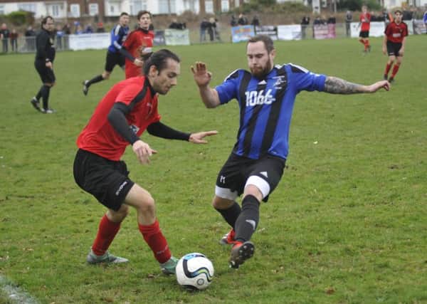Action from Hollington United's quarter-final victory at home to Sedlescombe Rangers. Picture by Simon Newstead