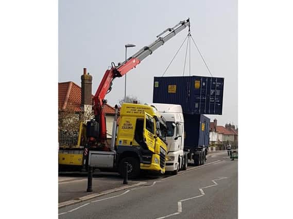 The crane in difficulty. Pic: Adur and Worthing Police