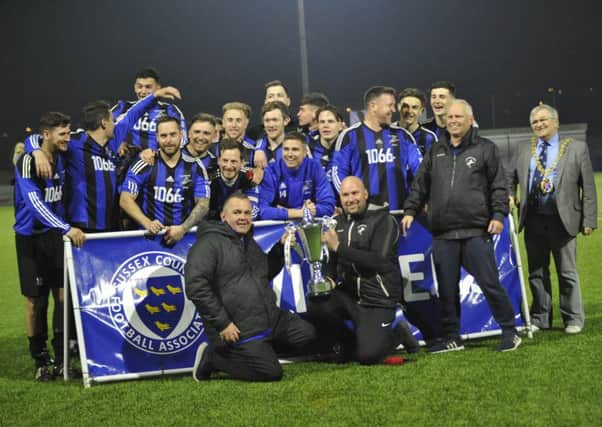 Hollington United celebrate winning the Sussex Intermediate Challenge Cup. Picture by Simon Newstead