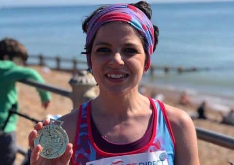 Sophie Smith after completing the  Brighton Half Marathon SUS-190423-104217001