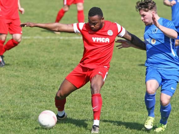 Tony Nwachukwu (left) added the third in Horsham YMCA's 3-0 victory at neighbours Broadbridge Heath on Saturday. All pictures by Derek Martin.