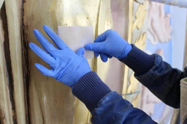 Sarah Mayfield carries out restoration work on the Ceres statue. Photograph: Brighton Dome