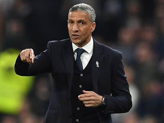 Chris Hughton gestures during the English Premier League football match between Tottenham Hotspur and Brighton and Hove Albion at the Tottenham Hotspur Stadium in London. Photo credit: DANIEL LEAL-OLIVAS/AFP/Getty Image