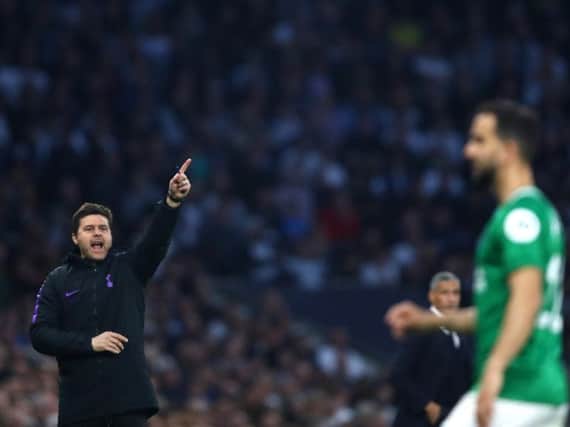 Mauricio Pochettino, Manager of Tottenham Hotspur gives his team instructions during the Premier League match against Brighton & Hove Albion. (Photo by Julian Finney/Getty Images)