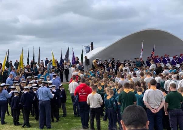 Scouts and their leaders gather at the Stage by the Sea for the promise renewal service